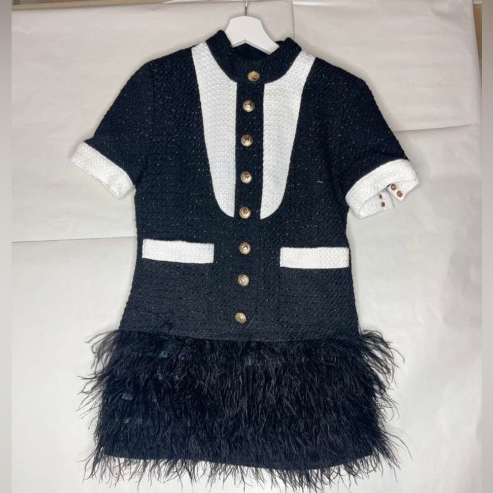 Elegant Black and White Formal Dress with Feather Detail